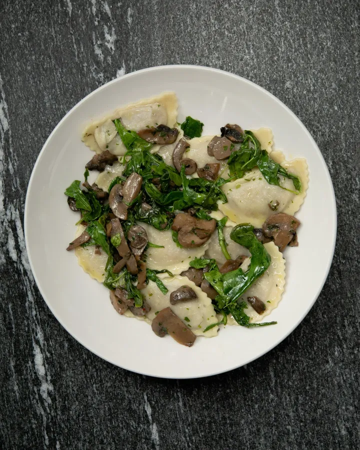 Mezzelune di Abbacchio Rucula e Funghi